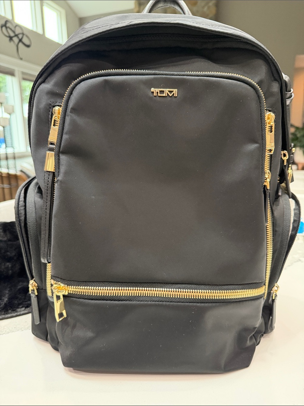 Tumi Black Backpack with Gold Hardware